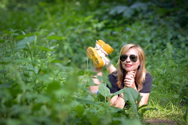portrait of Niamh Kelly operations manager at UrbanPulseMedia in warehouse setting